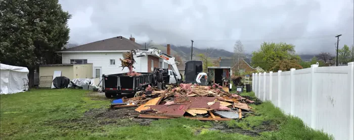 Demolition debris loaded out and the site raked back to rough grade