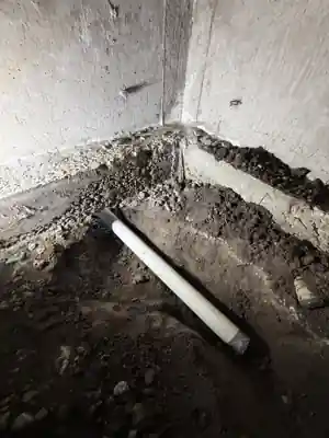 Opening the connection point at the existing home.